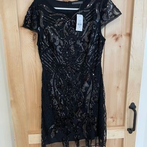 Black sequinned size large dress